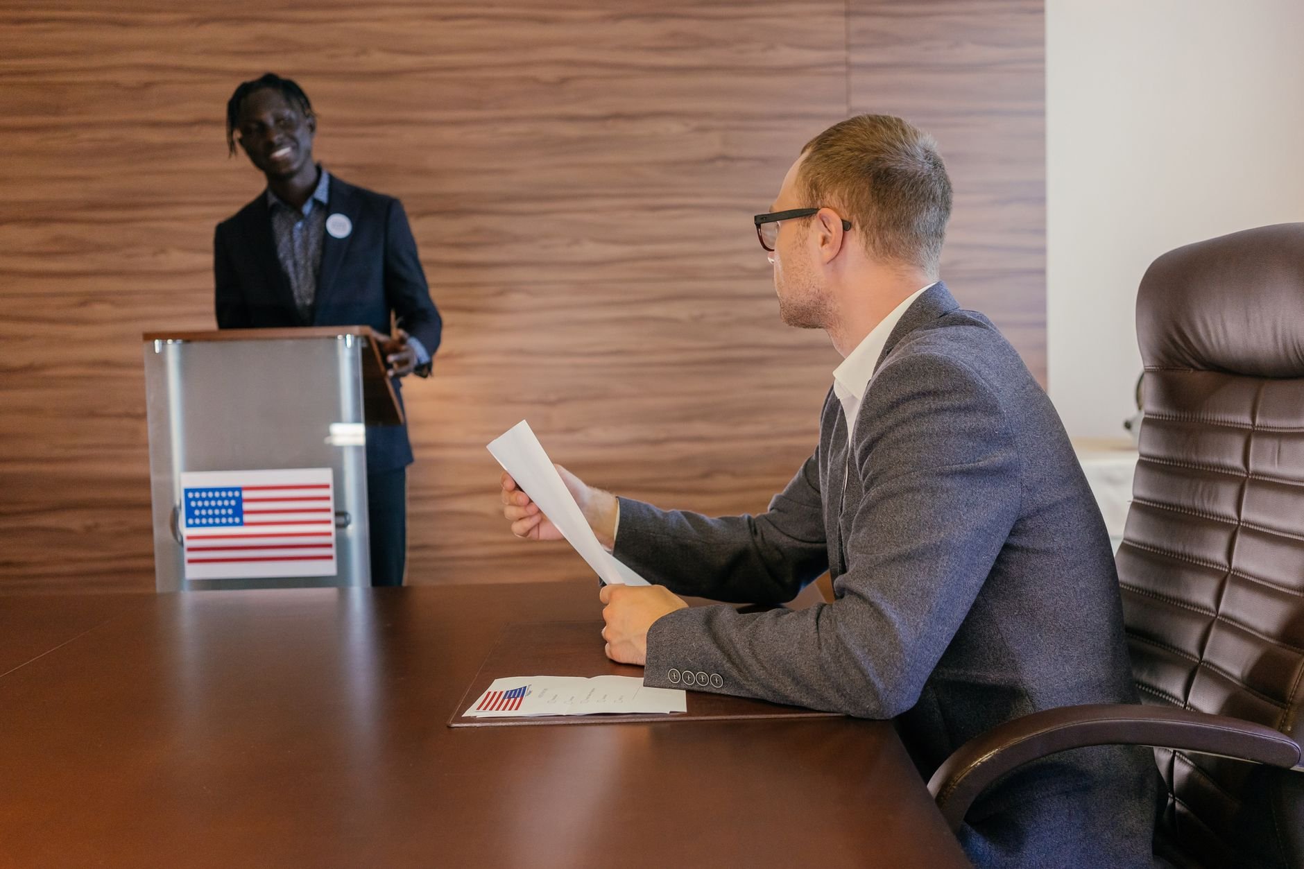 Two professionals in discussion during a strategic meeting